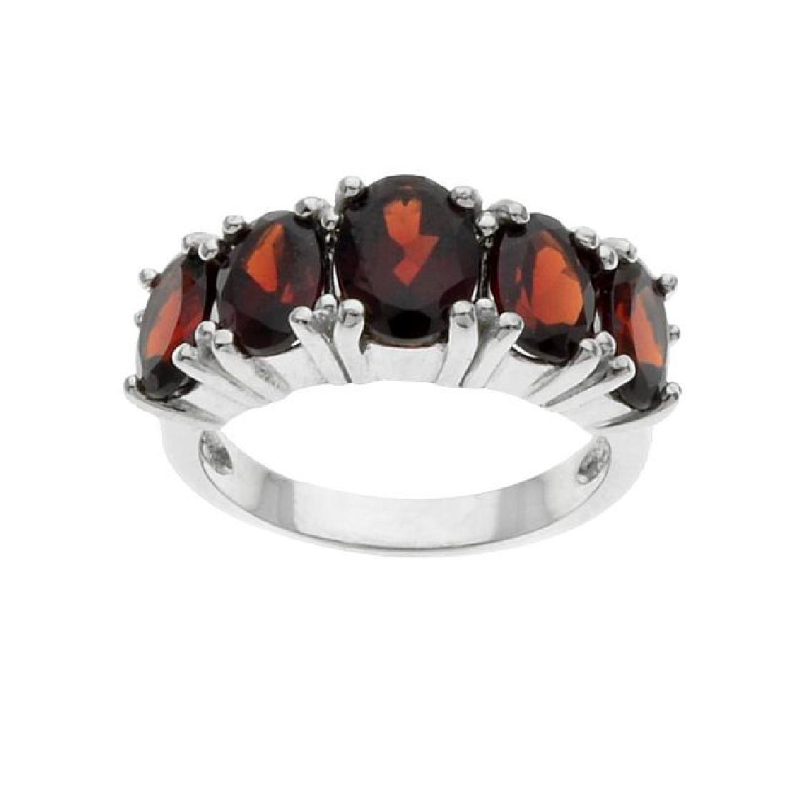 Silver 5.58ct Garnet Five-Stone Band Ring-SZ 6: • Genuine garnet • 5.58ct garnet • Five oval faceted cut gemstones • Gleaming rhodium over fine sterling silver • Garnet is the birthstone for the month of January.