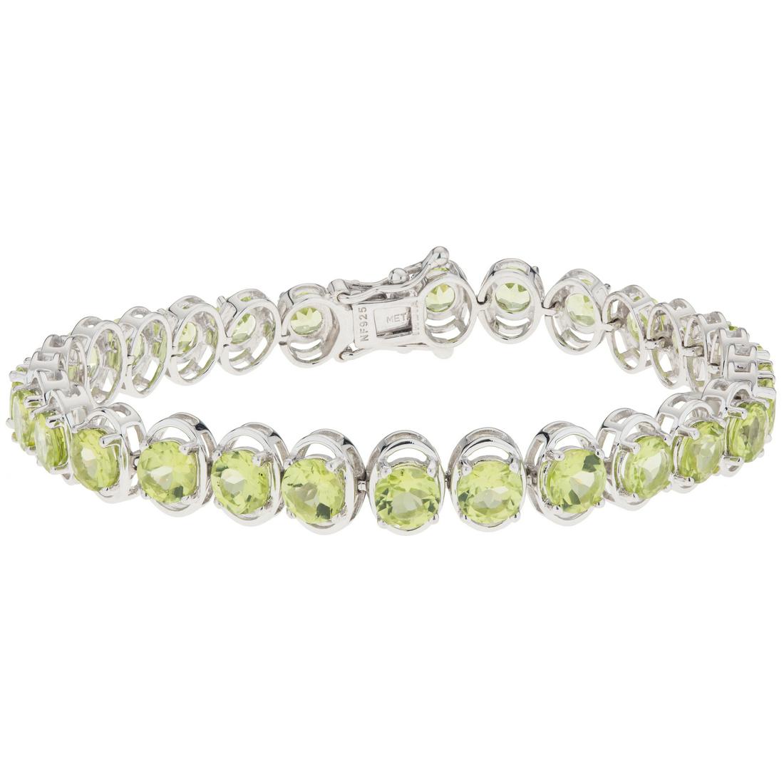Silver 13.72ct Peridot Line Bracelet 7.25": 925 Sterling Silver Oh-so-slender and oh-so-flattering, Pangea Mines ultra thin line bracelet is beautifully crafted in gleaming rhodium over sterling silver and lavishly adorned with sparkling genuin