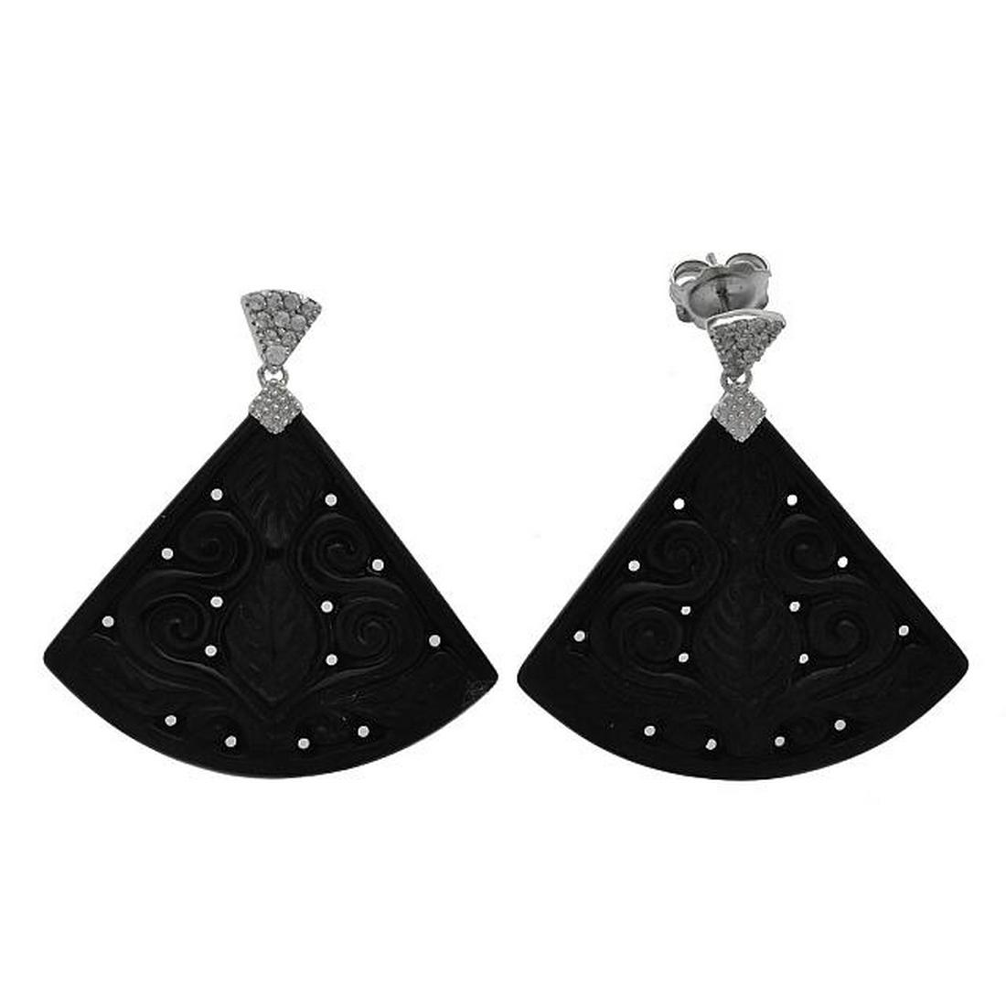Silver Carved Black Jade & Zircon Fan Drop Earring: • Genuine Carved black Jade & white Zircon Turquoise • Carved jade with leaf and vine swirls • Secured butterfly clasp • Gleaming rhodium over fine sterling silver