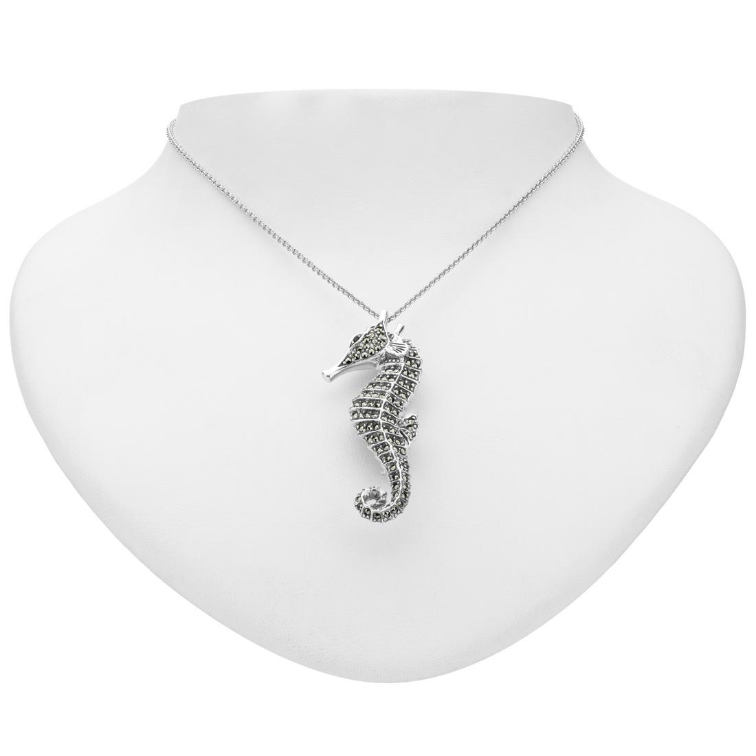 Silver Marcasite & Garnet Seahorse Pin/Pendant: Wear it as a pin or a lovely pendant necklace—this delightful design from Addison Lane’s Animal Kingdom collection does double duty. Long a symbol of patience and contentment, this charmin