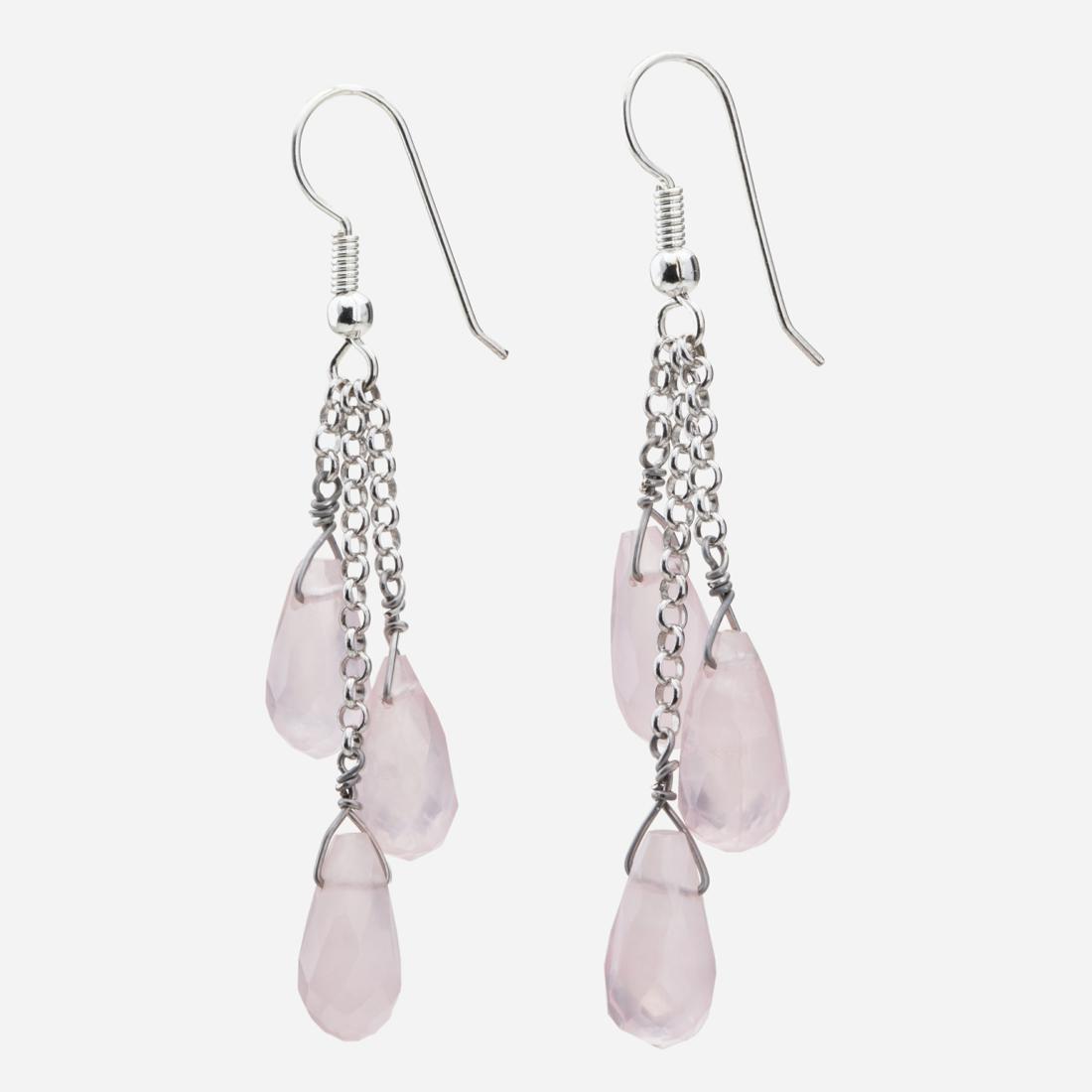 Sterling Silver Rose Quartz Drop Earrings: Fun and Flirty Style You will absolutely love these fun and flirty styled earrings from Tara Mesa! A gleaming sterling silver setting is adorned with a trio of hand selected rose quartz gemstones and