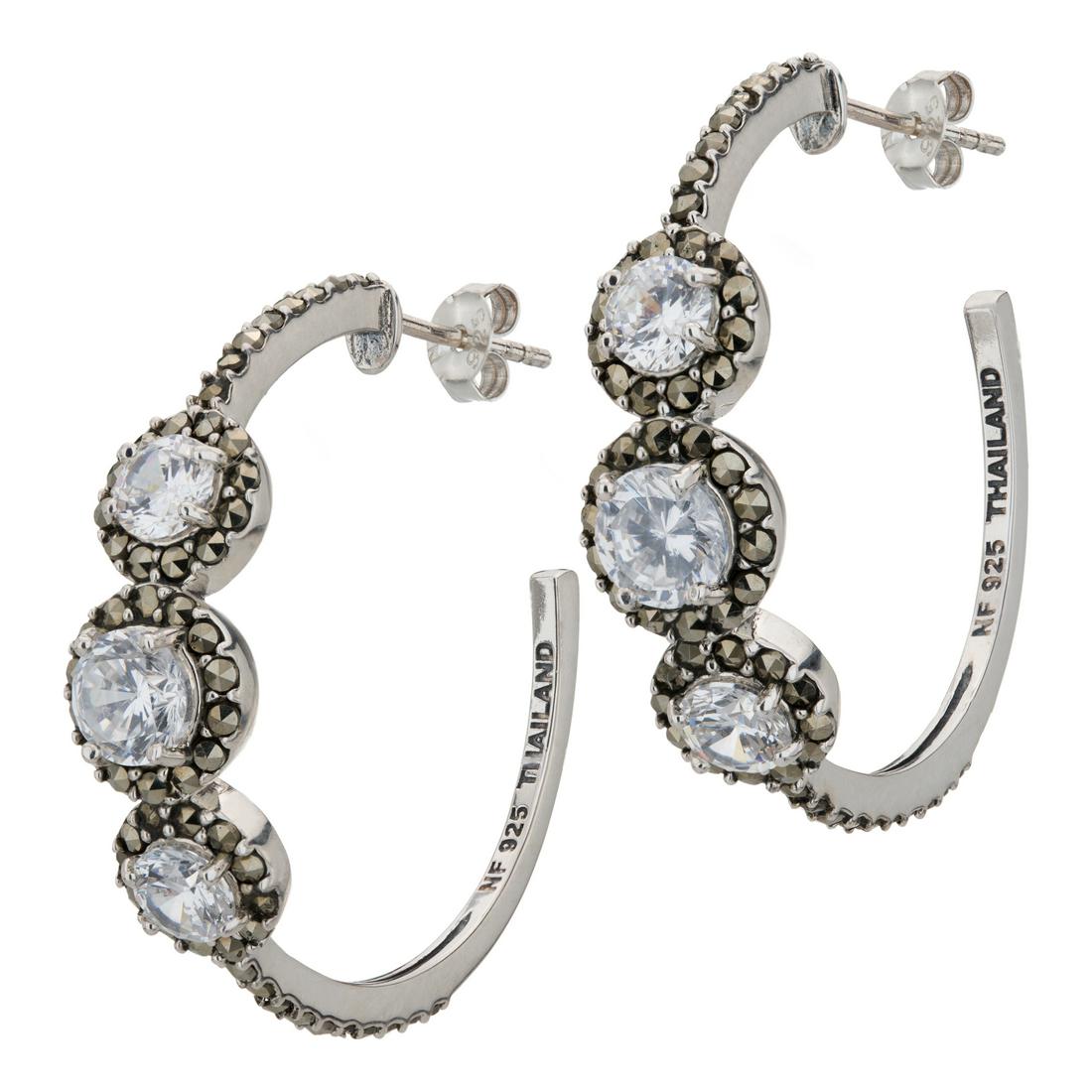 Sterling Silver Marcasite Hoop Earrings: From the Addison Lane Seraphina Collection comes these lovely, feminine earrings. Graceful lines are beautiful crafted in oxidized sterling silver with a striking black rhodium finish and a trio of cl