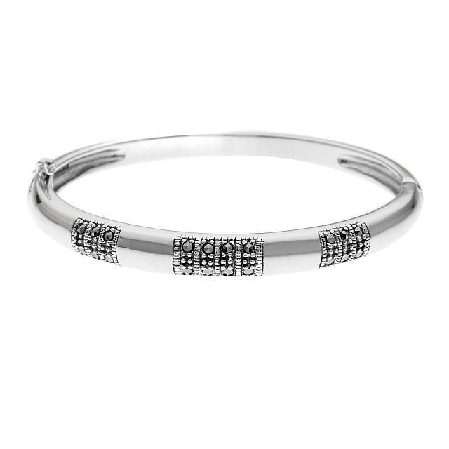 Sterling Silver Marcasite Bangle 7.5": • Genuine marcasite • Secured slide insert clasp • 7.5 inch wearable length • Gleaming rhodium over fine sterling silver