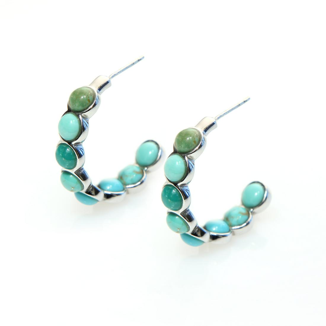 Silver Multi Turquoise Inside-out Hoop Earrings: • Genuine campo frio turquoise, campitos turquoise, mine#8 turquoise, Kingman turquoise & evans turquoise • Inside out hoop earrings • Comfortable butterfly clasp • Gleaming rh