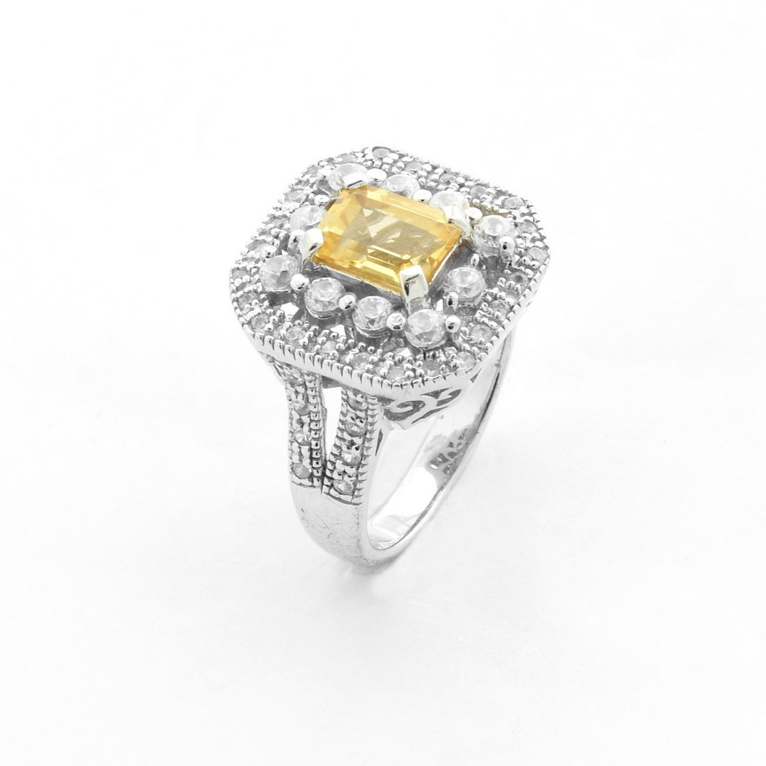 Silver 2.88ctw Citrine & Zircon Halo Ring-SZ 10: • Genuine citrine & white zircon • 2.88ct gemstones • One 8x6mm rectangular emerald cut citrine • Double halo of zircon around the center stone • Gleaming rhodium over fi