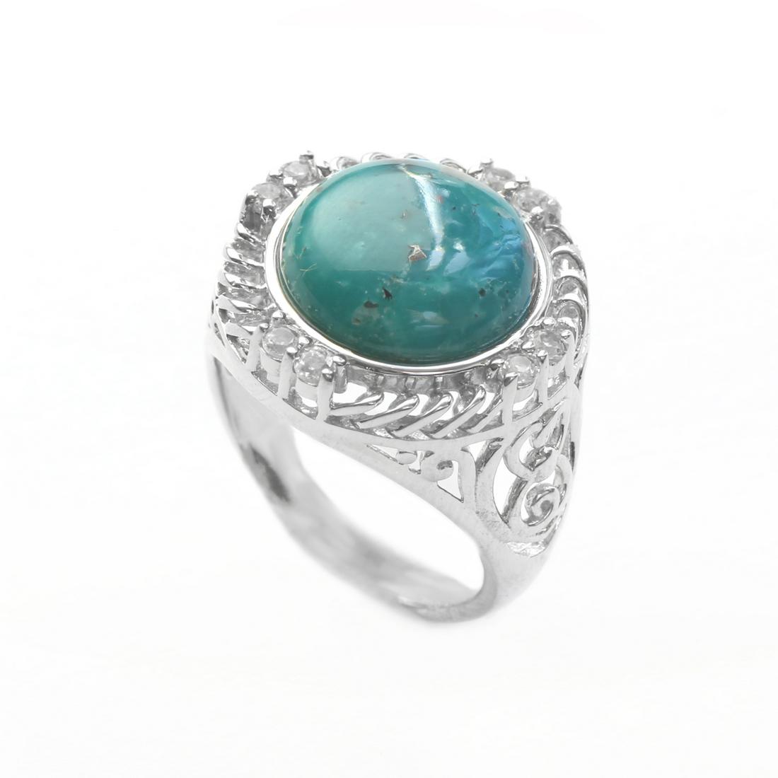 Silver Turquoise & White Topaz Textured Ring-SZ 8: One round alluring genuine campo frio turquoise cabochon is artfully crowned wtih mesmerizing spirals of sterling silver. Pairs of shimmering white topaz mark the cardinal points and open scrollwork s
