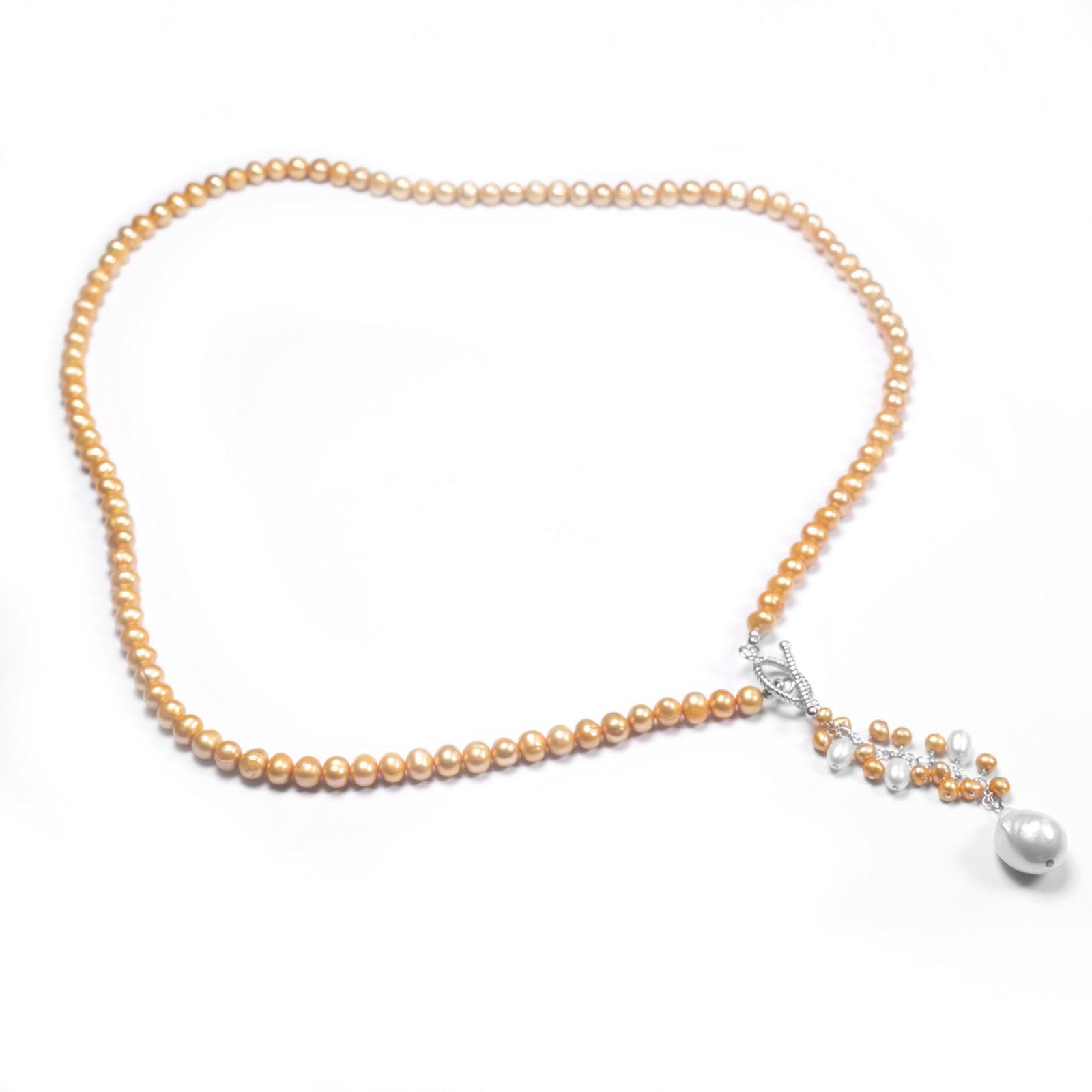 Sterling Silver Gold Fresh Water Pearl Y Necklace: • Genuine gold & white freshwater pearls • 28 inch length Y necklace • 5-7mm sizes pearls • Fancy toggle clasp • Gleaming rhodium over fine sterling silver