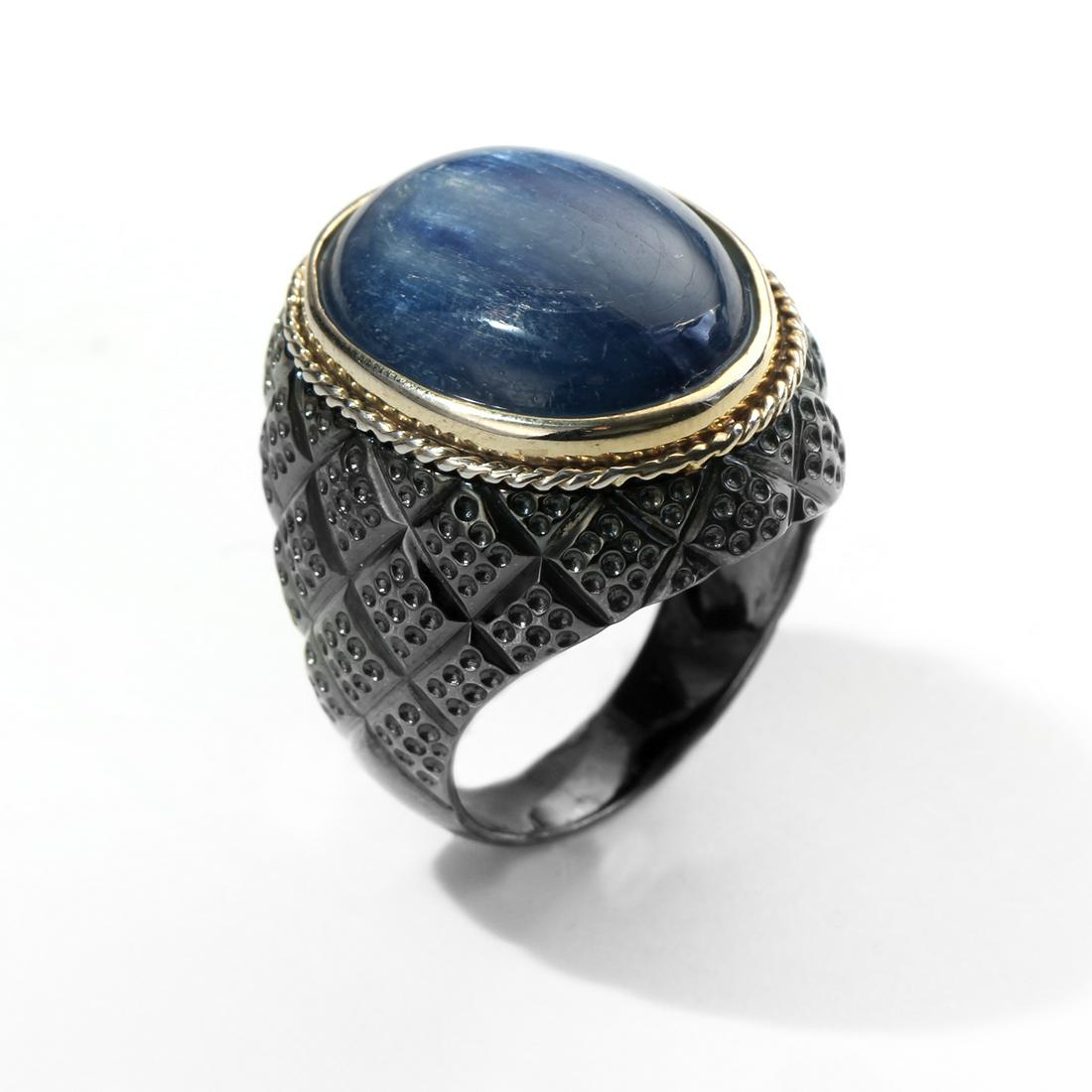 Sterling Silver Oval Kyanite Textured Ring-SZ 10: • Genuine kyanite • One oval 20x16mm cobochon • Diamond shape textured on the shank • Black rhodium with gold accents bezel over fine sterling silver