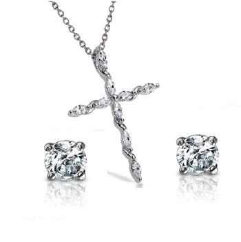 Sterling Silver Cross Pendant and Earrings Set: • Sparkling cubic zirconia • Setting: Prong/ Adhesive • Lobster clasp • Gleaming rhodium over fine sterling silver • Disclaimer: Gemstones may feature inclusions or imper