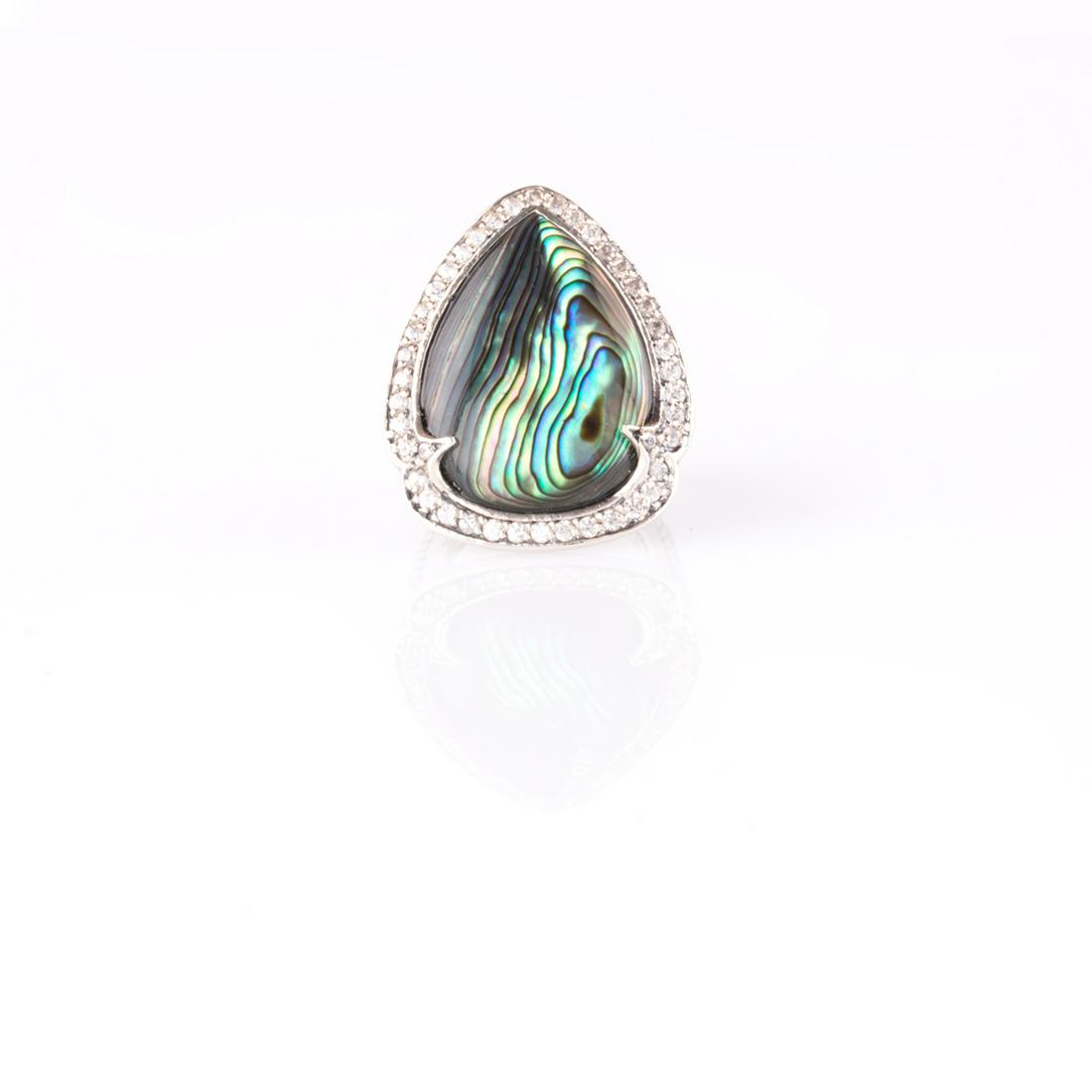 Silver Abalone & White Zircon Halo Ring-SZ 7: Metal: Sterling Silver_x000D_ Stone Information:_x000D_ Gemstone Choice: One pear shaped 23 x 17mm abalone_x000D_ White Zircon: Various round modified-brilliant cut 1.2-1.5mm_x000D_ Setting Type: Pron