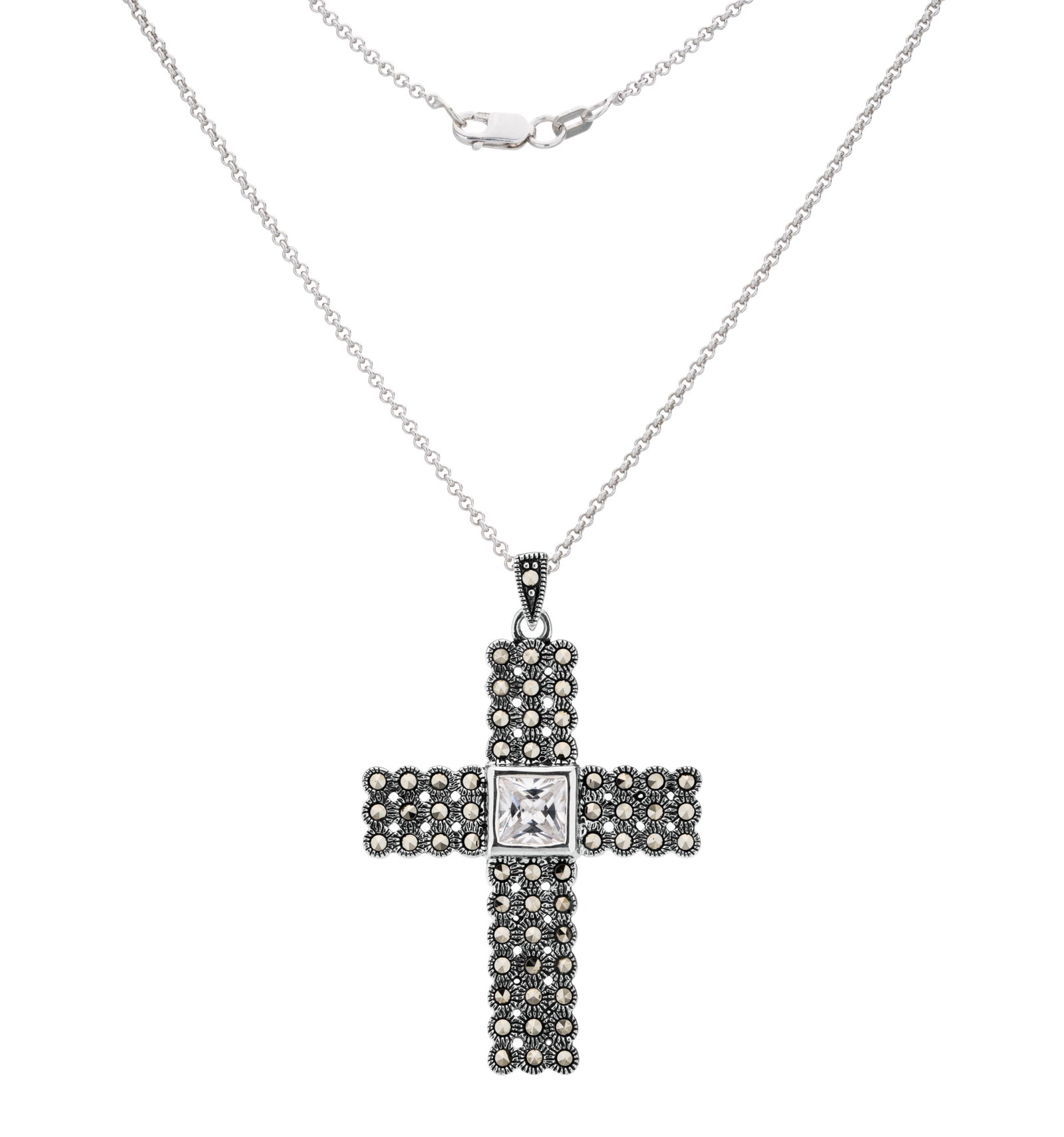 Sterling Silver Marcasite & CZ Cross Pendant: Addison Lane crafts a lovely pendant necklace embellished with sparkling pure white cubic zirconia and marcasite for your collection. From the Weekend Collection, this striking design adds a refreshin