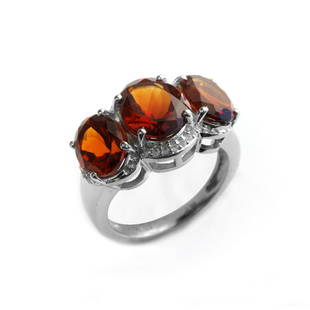 Silver 5.38ctw Honey Citrine 3-Stone Ring-SZ 7: Metal: Rhodium over sterling silver_x000D_Stone Information:_x000D_Honey Citrine: One oval cut 10 x 8mm and two oval cut 9 x 7mm_x000D_White Topaz: 20 round modified-brilliant cut 1mm_x000D_Setting