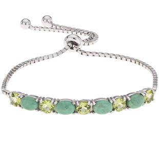 Silver Evans Turquoise & Peridot Slider Bracelet_x000D_: 925 Sterling Silver _x000D_ What a striking design! Beautifully styled by Pangea Mines skilled artisans, this handsome bracelet is lavishly adorned with genuine heavenly blue turquoise complemented by