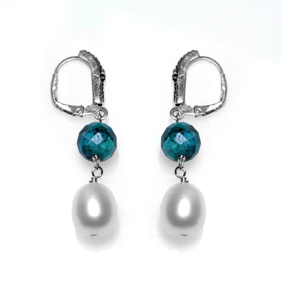 Sterling Silver Truquoise & Pearl Dangle Earrings: • Genuine white freshwater pearls & 8mm turquoise bead • Setting: Prong/ Adhesive • Measurement: 44mm L x 9mm W • Lever back clasp • Gleaming rhodium over fine sterling s