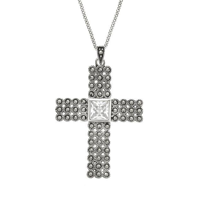 Sterling Silver Marcasite & CZ Cross Pendant: Addison Lane crafts a lovely pendant necklace embellished with sparkling pure white cubic zirconia and marcasite for your collection. From the Weekend Collection, this striking design adds a refreshin