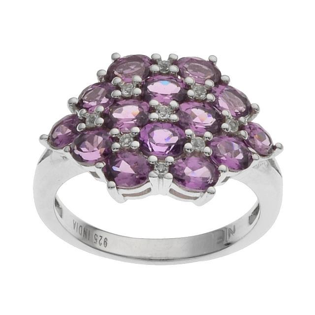 Silver Purple Garnet & Topaz Cluster Ring-SZ 10: Make a bold statement with this impressive design from the Pangea Mines Treasured Gem Collection. A cluster of royal purple garnets are beautifully complemented by a lavish field of sparkling white to