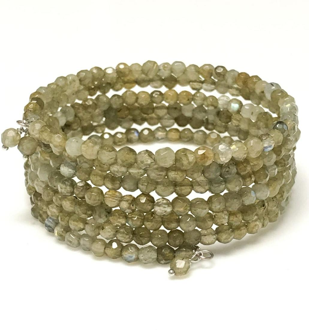 Labradorite Coil Bangle Bracelet: • Genuine Labradorite • Design: Beaded Bangle • Approx Length: 6.5 inch • No Clasp Closure • Disclaimer: Gemstones may feature inclusions or imperfections and the images 