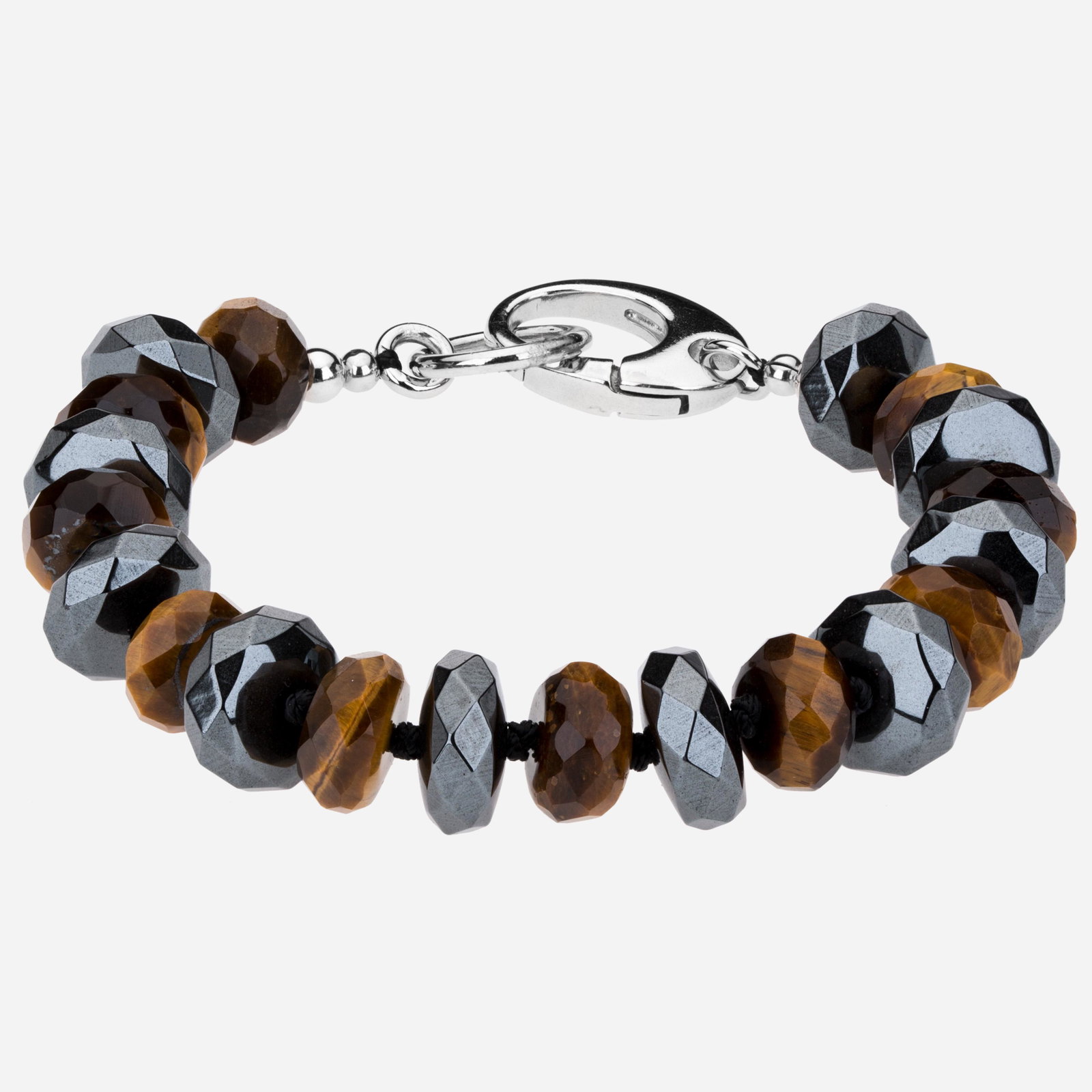 Silver Tiger Eye and Hematite Bead Bracelet 7.5": Tara Mesa crafts the perfect accent with this lovely 7.5” rondelle bead bracelet. Hand selected genuine Tiger Eye and hematite gemstones alternate on this striking design to create an interestin