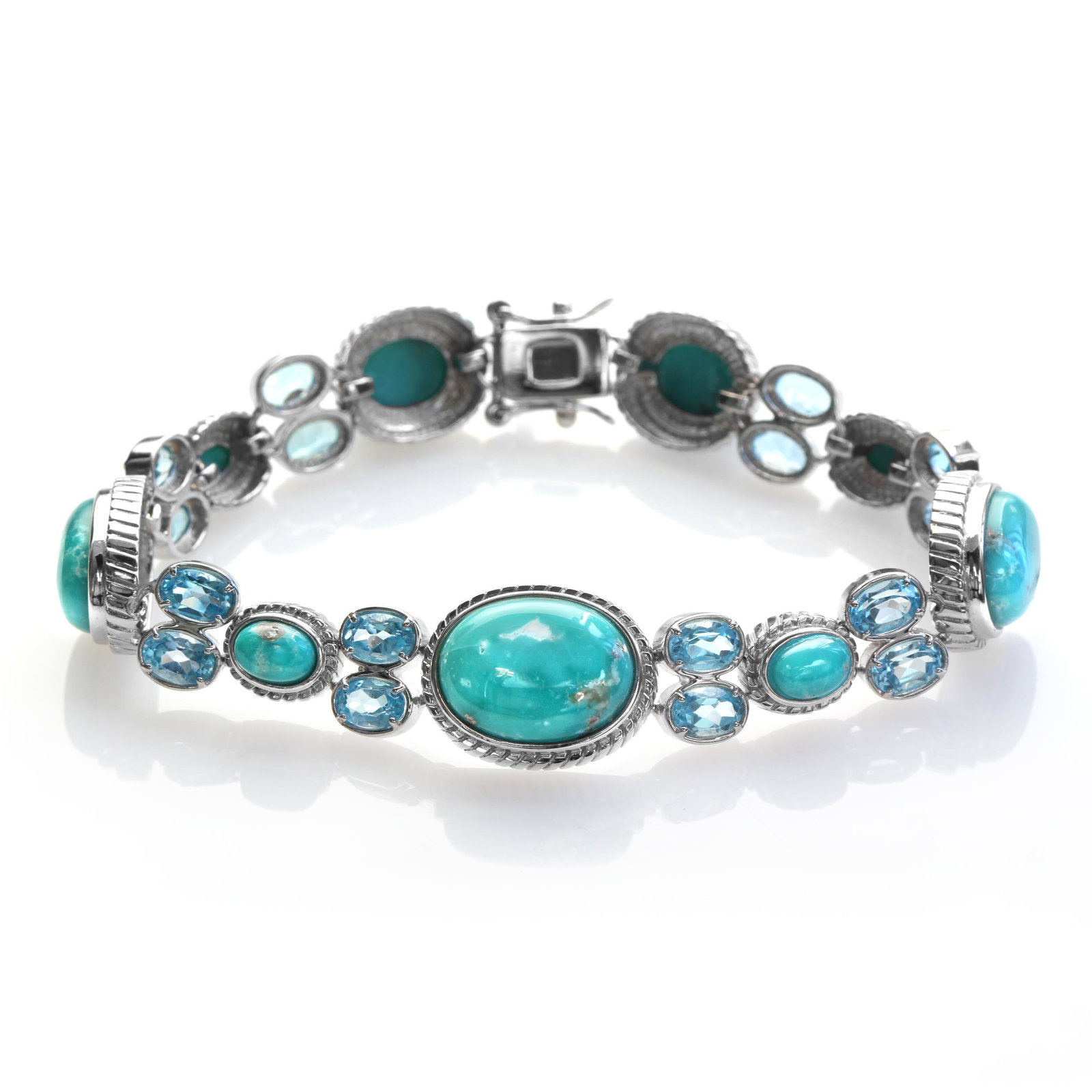 Silver Turquoise & Swiss Blue Topaz Bracelet 6.7": Pangea Mines Treasured Gems Collection Genuine sparkling swiss blue topaz and campo frio turquoise gemstones adorn this lovely design from the Pangea Mines Treasured Gems Collection. Crafted in gleami