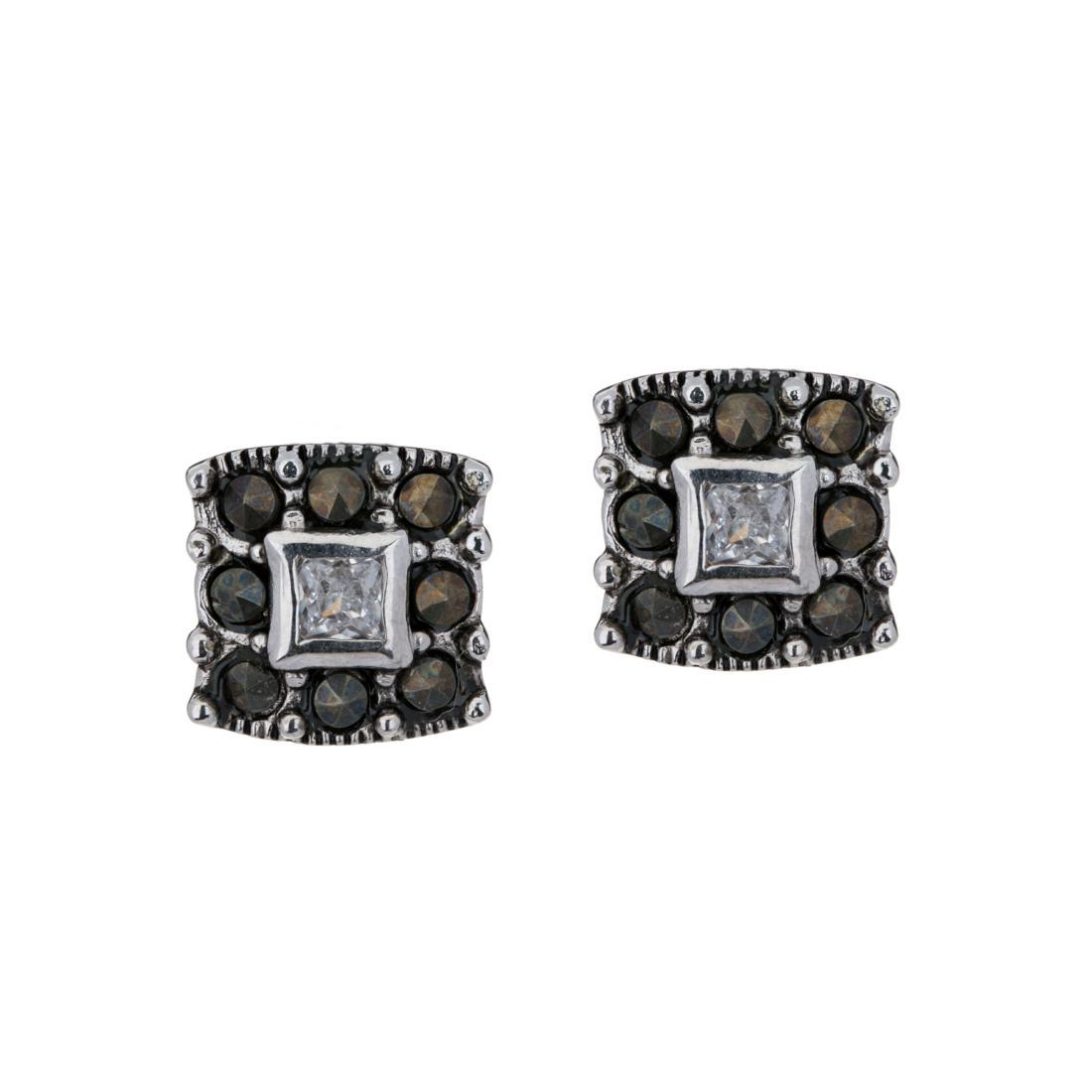 Silver Tone Marcasite Square Stud Earrings: • Genuine marcasite • Square design stud • Butterfly backings for comfortable fit • Gleaming rhodium over brass