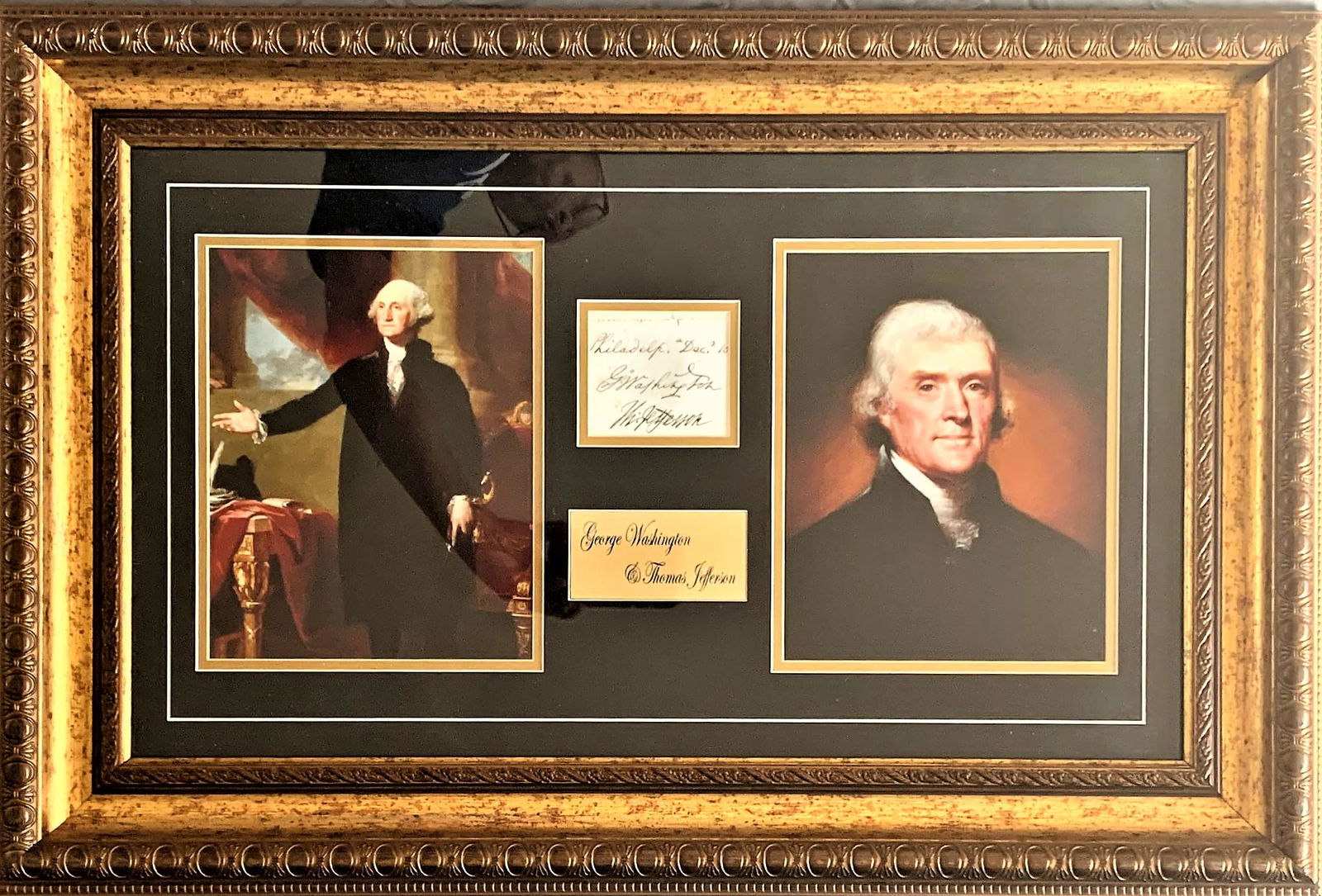George Washington & Thomas Jefferson Signed Showcase: GEORGE WASHINGTON (1732-1799) AND THOMAS JEFFERSON (1743-1826 signed 3 x 3 excised from a larger Document. The paper is darkly aged with the wording Philadelphia, Dec. 10, above the first Presidents s