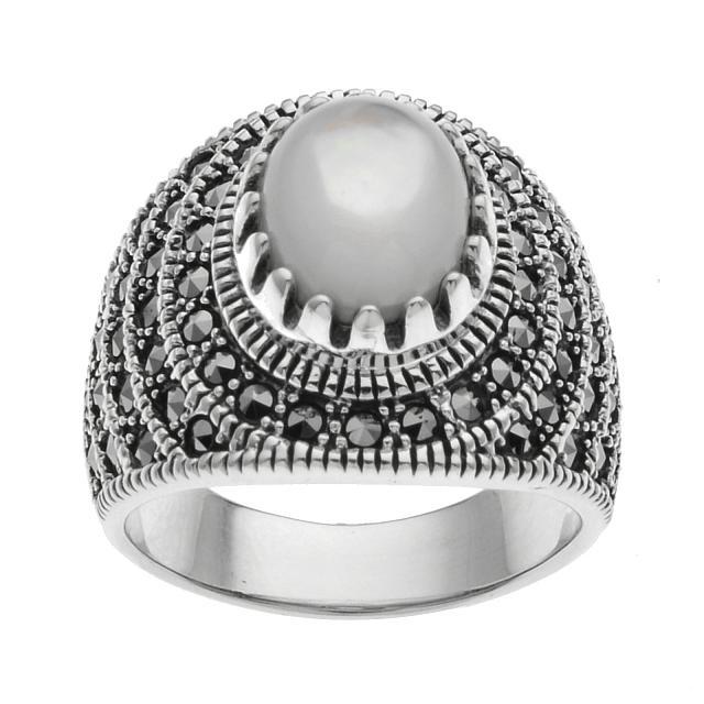 Sterling Silver MOP & Marcasite Ring-SZ 10: Addison Lane creates a beautiful statement ring from the Bora Bora Collection and adorns it with an impressive iridescent mother of pearl cabochon with genuine marcasite accents. Crafted in oxidized s