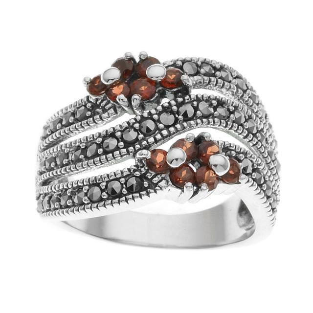 Silver Garnet & Marcasite Floral Ring-SZ 10: Addison Lane turns to vintage classics for inspiration with this lovely design from the Felicity Collection. Beautifully crafted with a field of sparkling marcasite accented by genuine fiery Mozambiqu