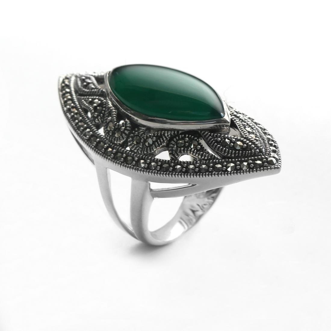 Sterling Silver Green Agate & Marcasite Ring-SZ 6: Metal: Rhodium over sterling silverStone Information:Green agate: marquise 24x13mm and marcasite: round cut 1mmSetting Type: Bezel/adhesiveMeasurements: 44mm L x 22mm W x 13mm HCountry of Origin: Thai