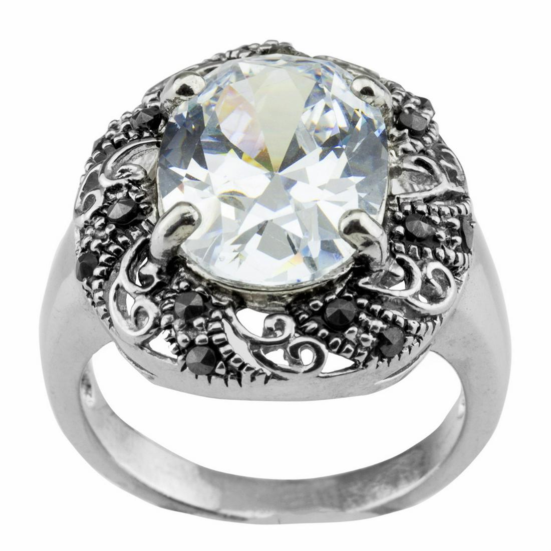 Sterling Silver Oval CZ & Marcasite Ring-SZ 7: • Sparkling cubic zirconia• Dimension: 20mm X 21mm X6.5mm• Gleaming rhodium over fine sterling silver