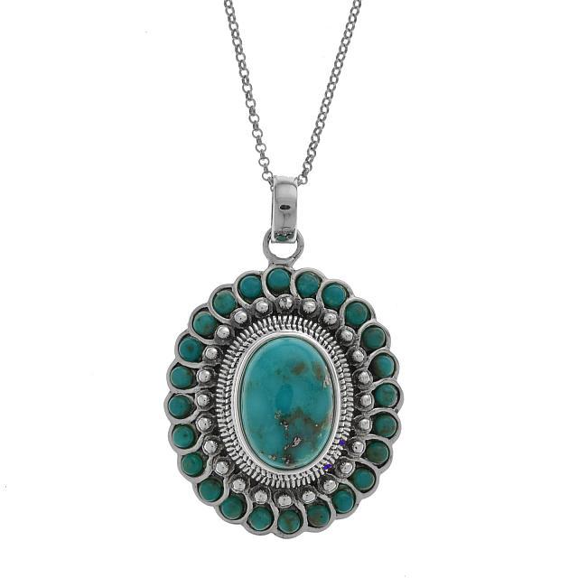 Silver Oval Campo Frio Turquoise Flower Pendant: The rich natural beauty and color of genuine Campo frio turquoise is beautifully showcased in our lovely pendant necklace. Crafted in 925 sterling silver, this striking design features a 17x12mm oval 