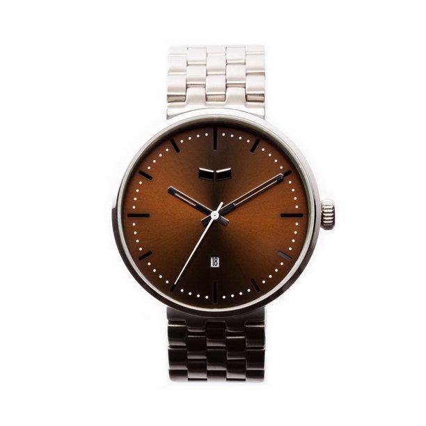 Vestal Unisex Roosevelt Metal Analog Display Quartz: The Roosevelt is a signature Vestal timepiece with its clean slim line case and straightforward dial. The premium 3 hand Japanese analog movement with date rests inside a multi-layered 42mm 316L solid