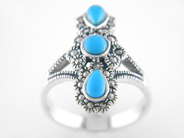 Marcasite & Turquoise Split Shank Ring SZ 8: • Metal: Brass• Metal Color: Silver and Oxidize• Stone: Simulated Turquoise and Marcasite• Size: 8• Disclaimer: Gemstones may feature inclusions or imperfections and the 