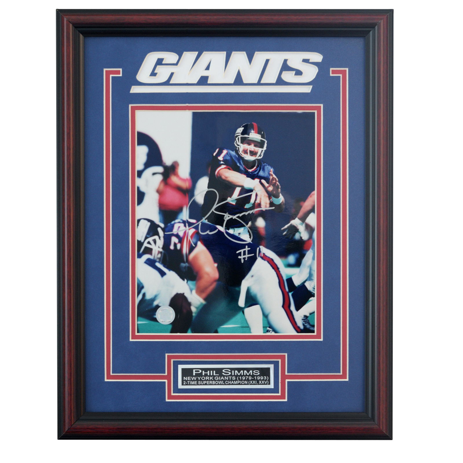 Phil Simms New York Giants Framed Signed 8x10v GFA: Phillip Martin "Phil" Simms (born November 3, 1955) is a former American football quarterback, and currently a television sportscaster for the CBS network. After a standout career at Morehead State Un