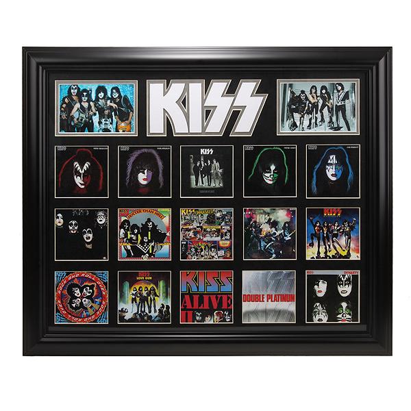 Kiss Album Record Collage 24x20 Custom Framed: Kiss is an American rock band formed in New York City in January 1973. Well known for its members' face paint and flamboyant stage outfits, the group rose to prominence in the mid to late 1970s