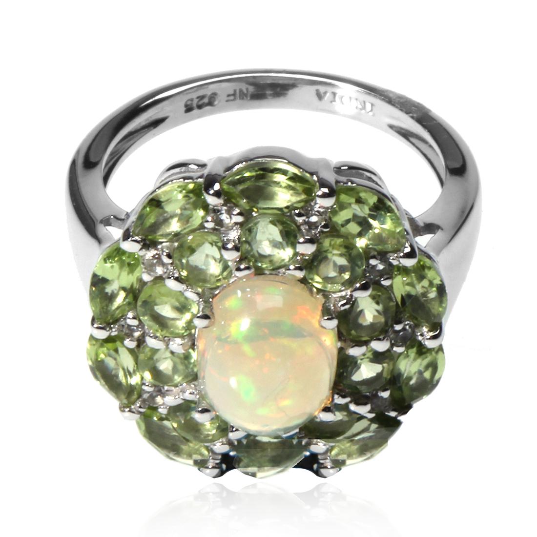 Silver Ethiopian Opal & Peridot Halo Ring-SZ 9: Make a statement and make it beautifully with this striking design from the Pangea Mines Treasured Gems Collection. Beautifully crafted in gleaming anti-tarnish rhodium over sterling silver and adorne