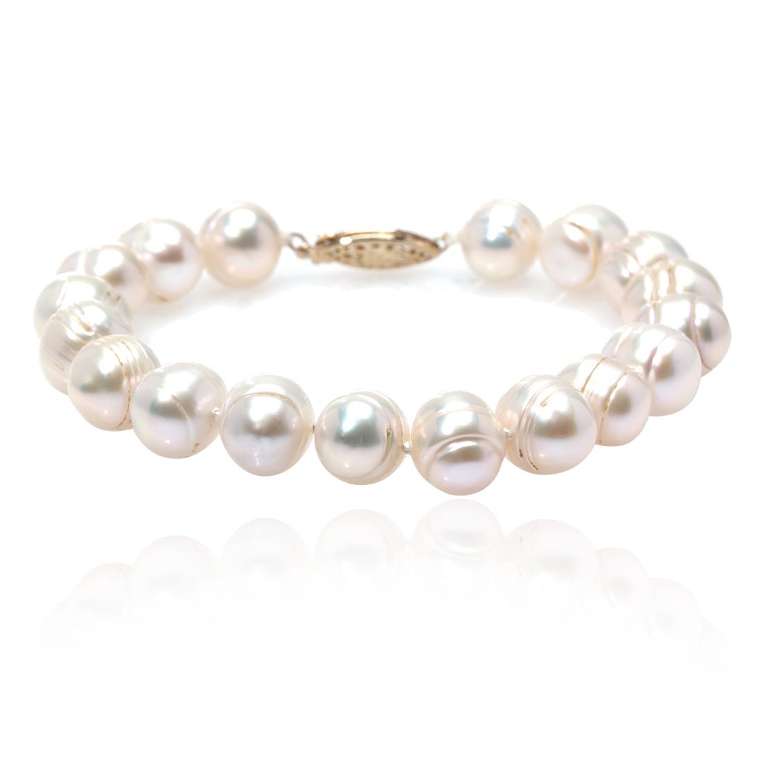14K Baroque Pearl Bracelet 8": 14K Baroque Pearl Bracelet 8" • Metal: 14KT Gold • Stone: Pearl • Width: 12 mm • Total Weight: 26.6 grams • Finish: High Polished • Closure: Fishhook Clasp
