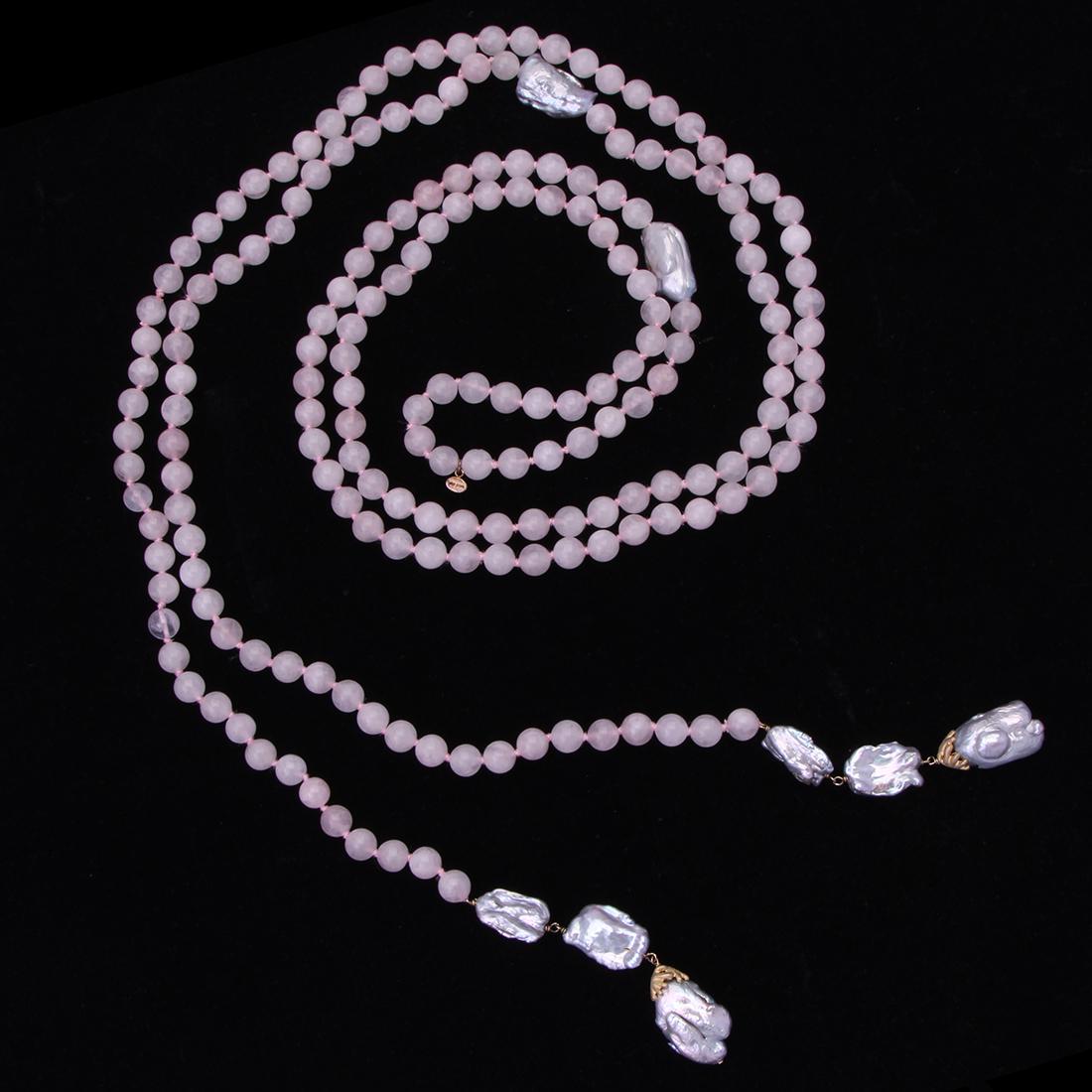 73 in Knotted Rose Quartz & Pearl Tassel Necklace: 73 in Knotted Rose Quartz & Pearl Tassel Necklace • Metal: Sterling Silver • Stone: Rose Quartz & Pearl • Dimension: 73" X 14.8 mm • Total Weight: 186.6 gram
