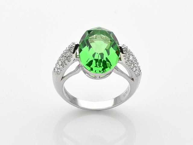 Silver Oval Green Swarovski Crystal Ring-SZ 6: Metal: Rhodium over sterling silver Stone Information: one oval cut 10 x 14mm green Swarvoski crystal and various round cut 1.3mm white Swarvoski crystals Setting Type: ProngMeasurements: 9/16"L x 7/8