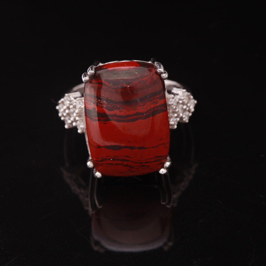 Size 7.5 Sterling Jasper & White Zircon Ring: Size 7.5 Sterling Jasper & White Zircon Ring • Metal: Sterling Silver • Stone: (1)18X13 Mm Jasper &White Zircon • Width: 17.9 Mm • Total Weight: 5.83 Grs • Finish: Rhodiu