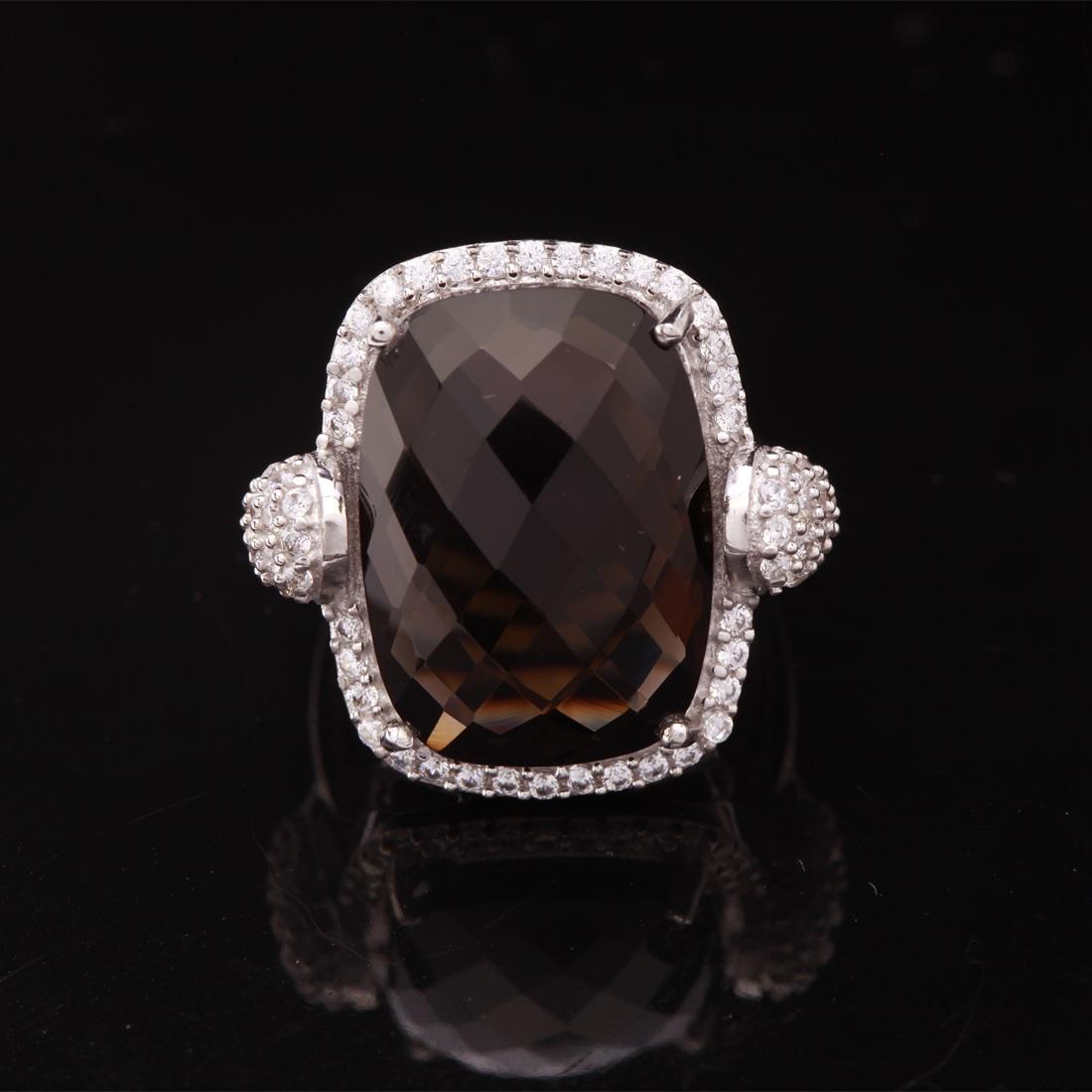 Size 8.5 Sterling Silver Smoky White Zircon Ring: Size 8.5 Sterling Silver Smoky White Zircon Ring • Metal: Sterling Silver • Stone: (1)18X13Mm-Smoky Qtz&White Zircon • Width: 20.9 Mm • Total Weight: 6.98 Grs • Finish: R