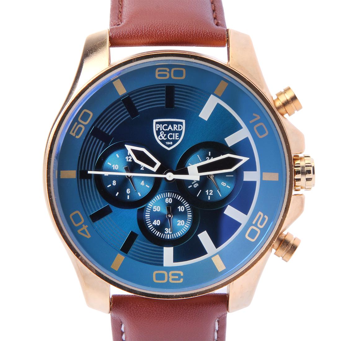 Picard & Cie Excalibur D-T Gold On Blue Mens Watch: The Picard & Cie Excalibur dual time men's watch features a gold tone case, blue dial and genuine brown leather strap