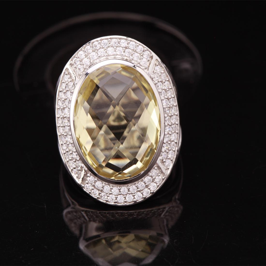 Size 7.5 Checkerboard Lemon Topaz Silver Ring: Size 7.5 Checkerboard Lemon Topaz Silver Ring • Metal: Sterling Silver • Stone: (1)17X13Mm Lemon Topaz & White Topaz • Width: 26.2 Mm • Total Weight: 7.67 Grs • Finish: R