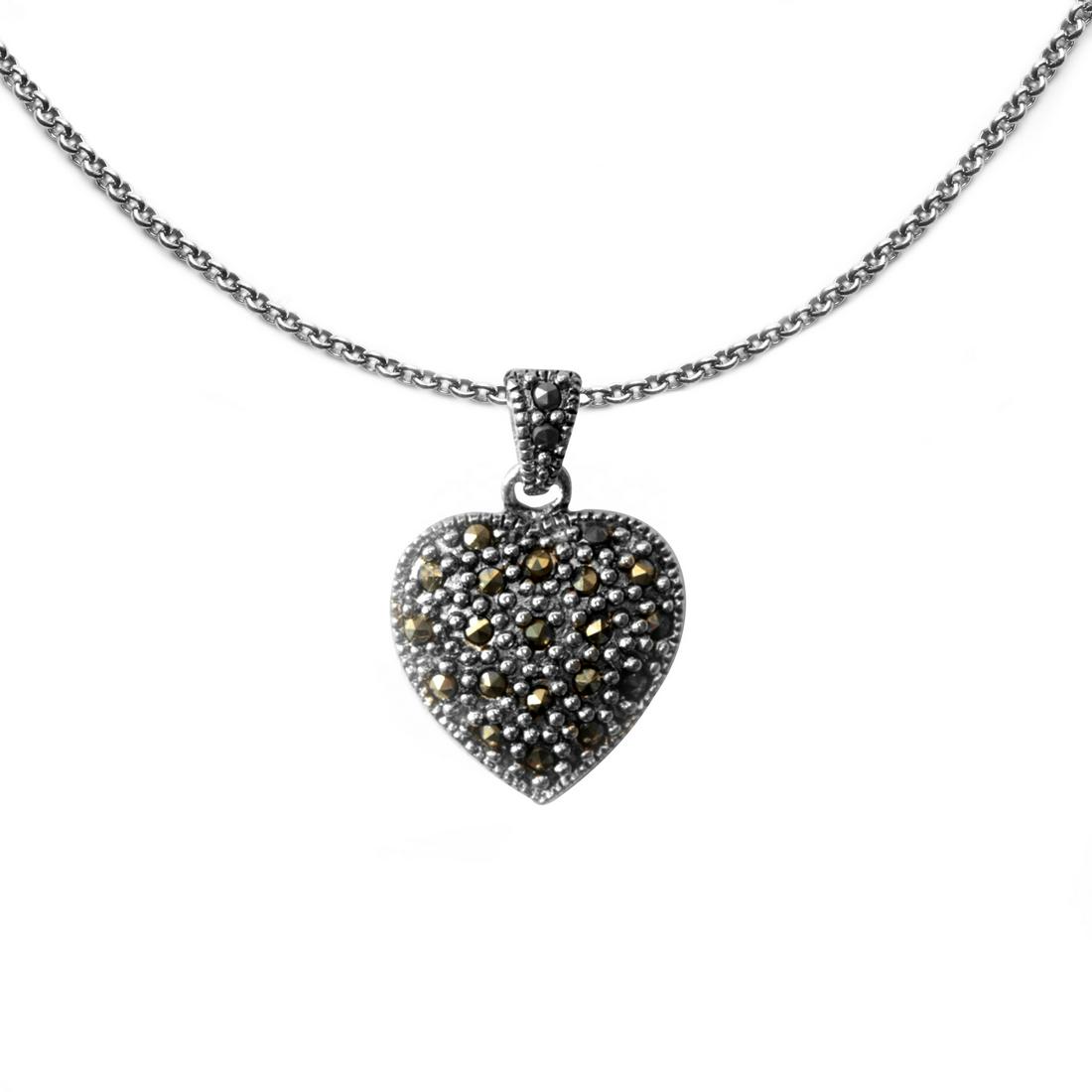 Silver Tone Marcasite Heart Pendant: • Genuine marcasite • Setting: Prong• Measurement: 21mm L x 15mm W • Gleaming rhodium over brass• Disclaimer: Gemstones may feature inclusions or imperfections and the im