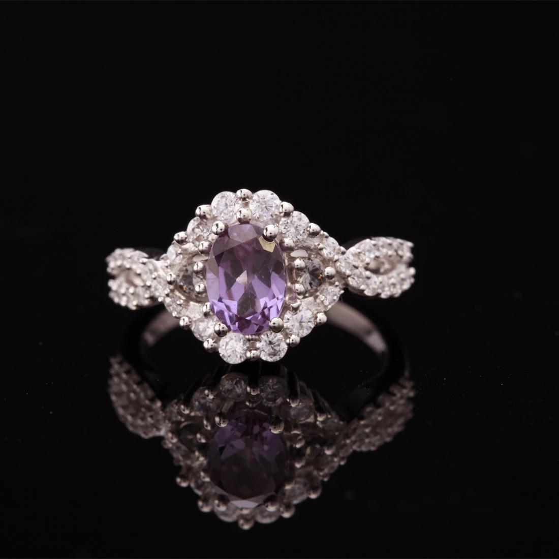 Size5.25 Sterling Alexandrite White Topaz Ring: Size5.25 Sterling Alexandrite White Topaz Ring • Metal: Sterling Silver • Stone: Syn Alexandrite&White Topaz • Width: 10.8 Mm • Total Weight: 3.03 Grs • Finish: Rhodium