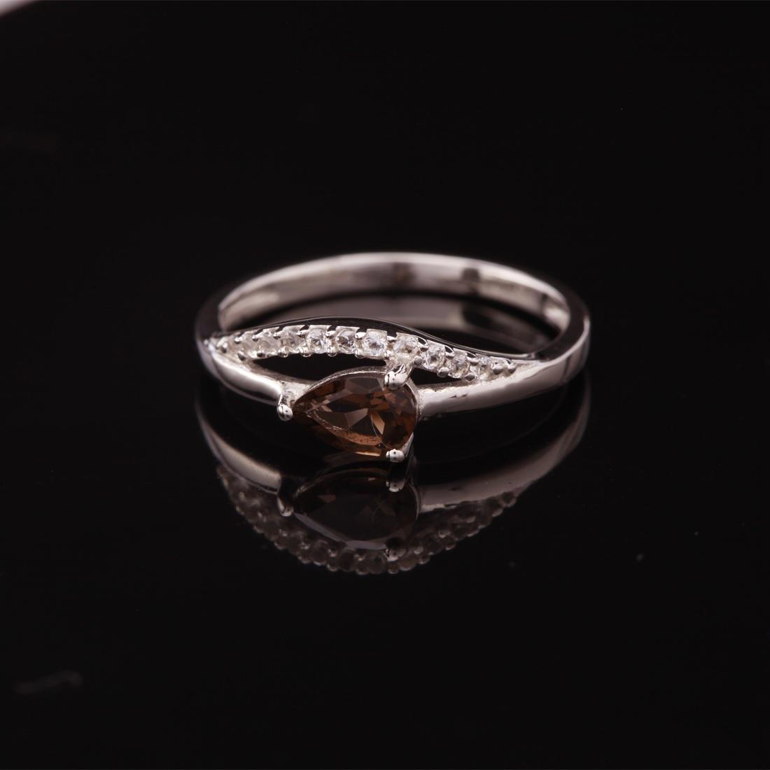 Size 7.25 Sterling Silver Smoky & Zircon Ring: Size 7.25 Sterling Silver Smoky & Zircon Ring • Metal: Sterling Silver • Stone: Smoky & White Zircon • Width: 6.1 Mm • Total Weight: 1.58 Grs • Finish: Rhodium