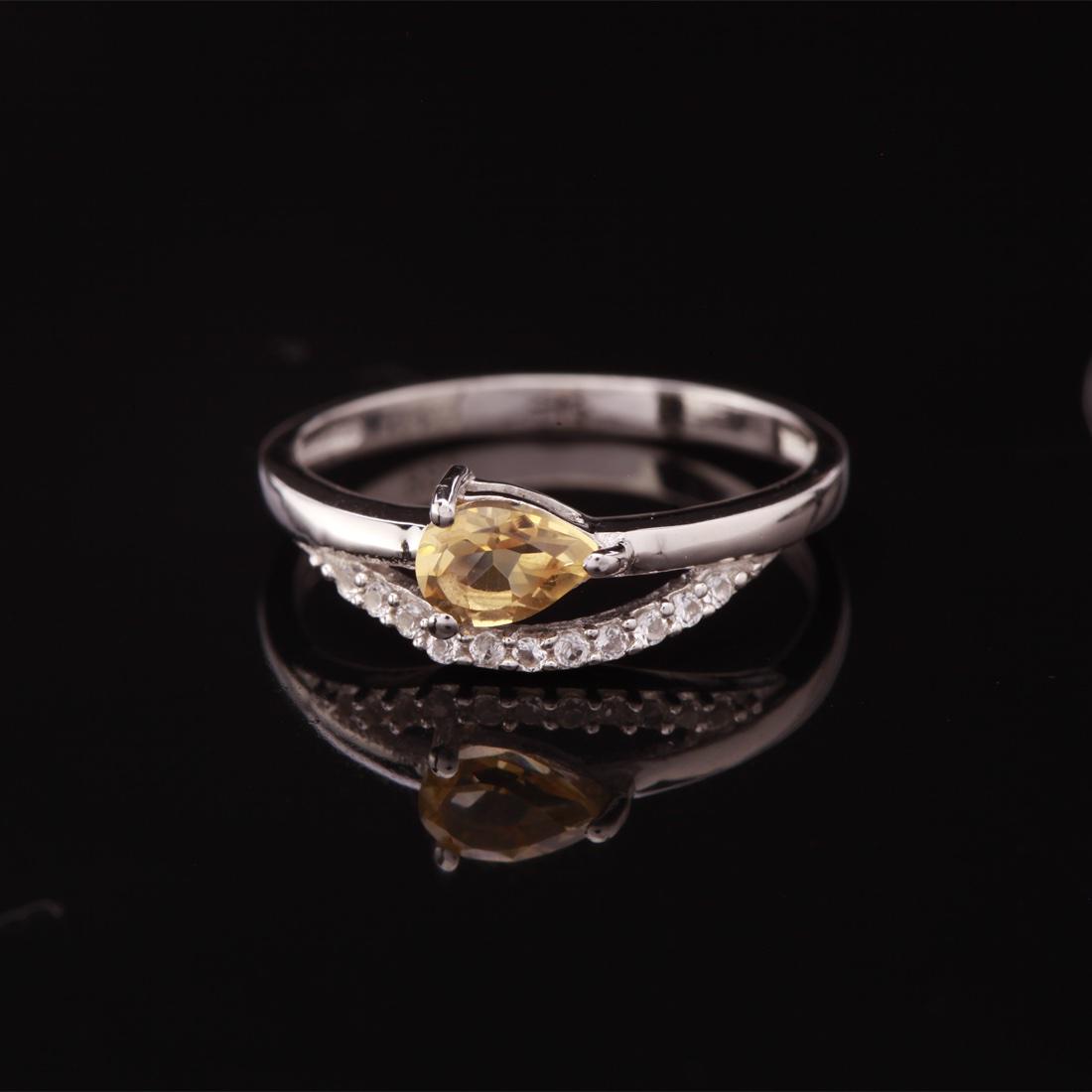 Size 8 Sterling Silver Citrine & Zircon Ring: Size 8 Sterling Silver Citrine & Zircon Ring • Metal: Sterling Silver • Stone: Citrine & White Zircon • Width: 6.3 Mm • Total Weight: 1.62 Grs • Finish: Rhodium