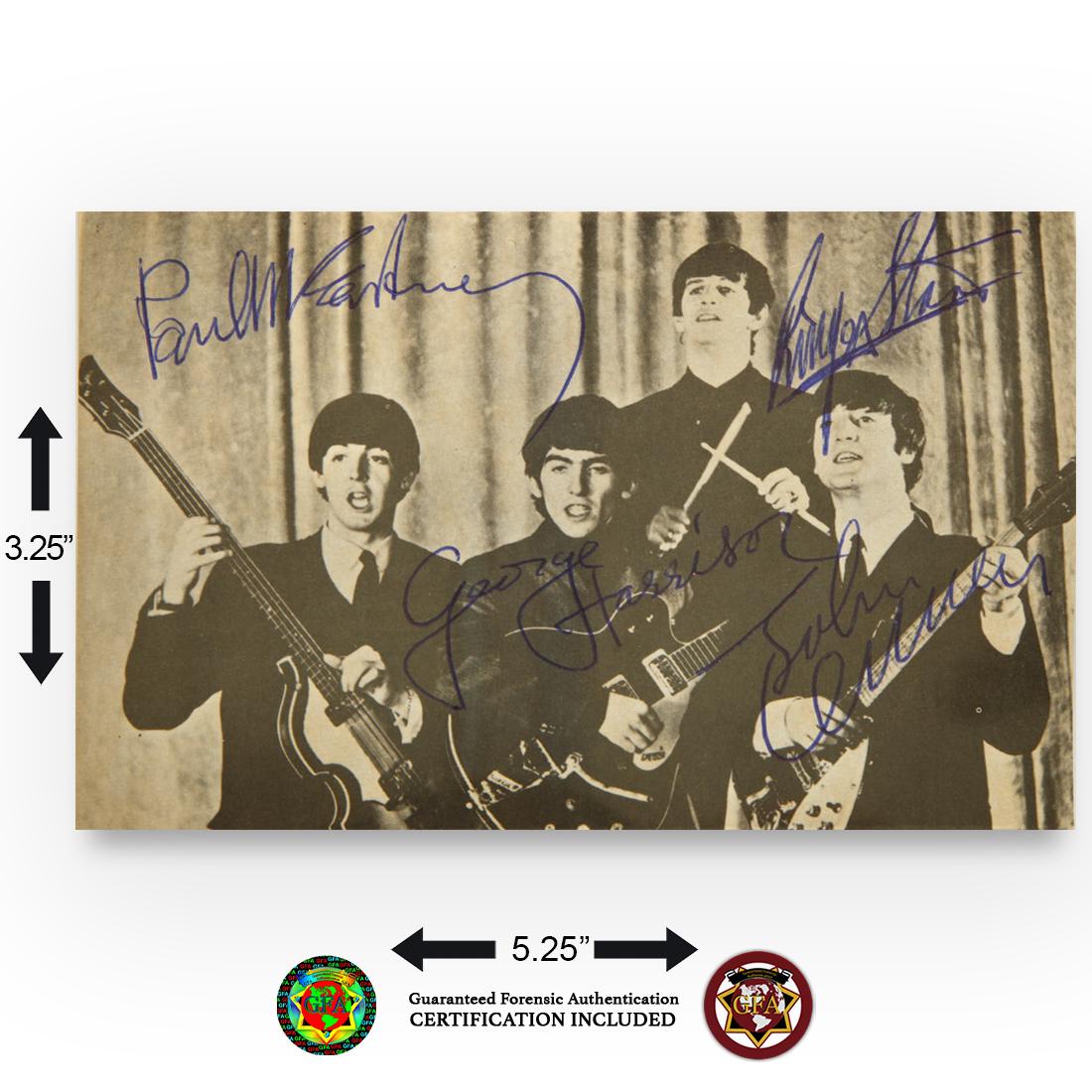 The Beatles Signed Photograph Postcard: The Beatles (1960-1970) signed 3.25 x 5.25 Black and White Photo Postcard of the Fab Four performing live. John Lennon, Paul McCartney, George Harrison and Ringo Starr each has boldly signed next to t