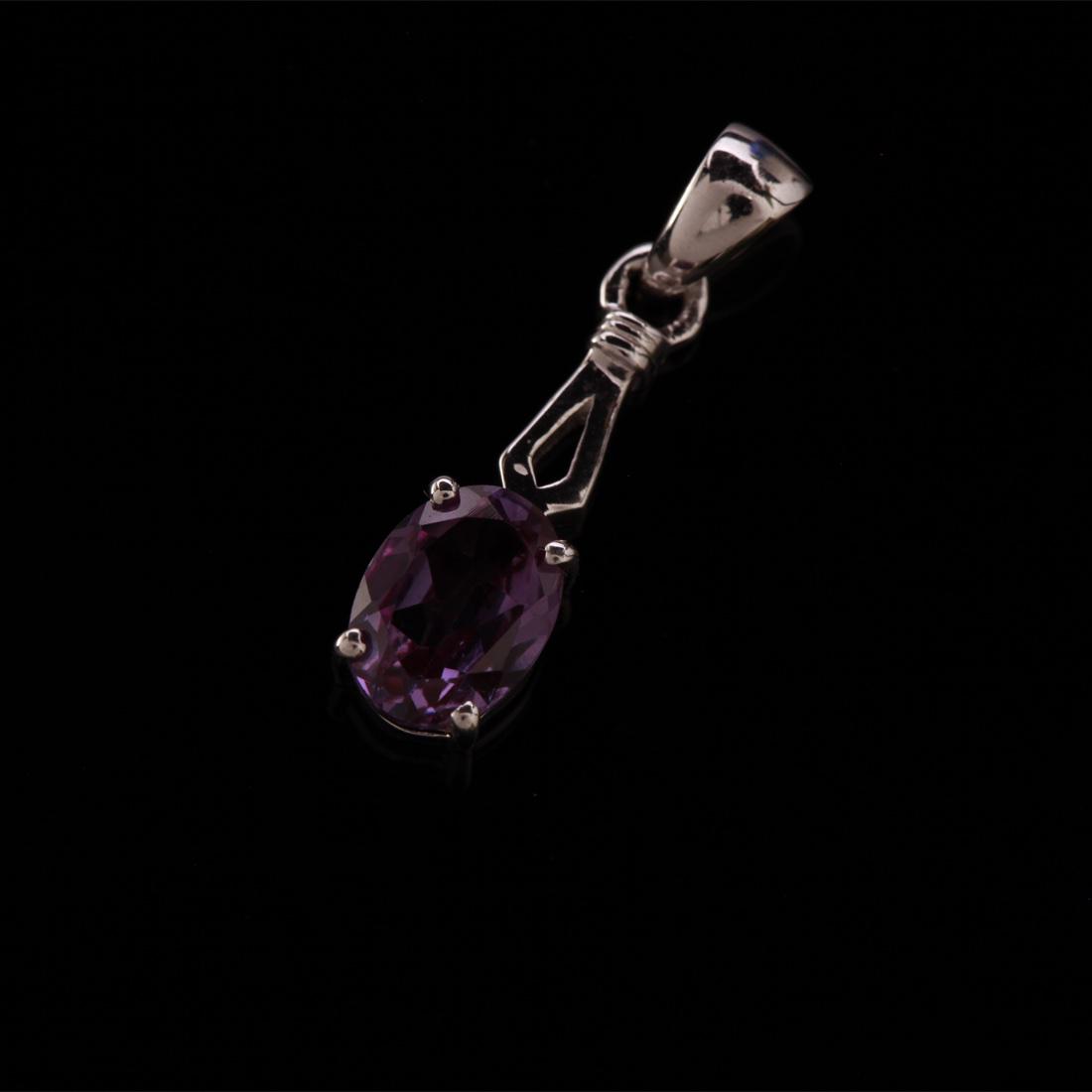 Sterling Silver Syn Alexandrite Pendant: Sterling Silver Syn Alexandrite Pendant • Metal: Sterling Silver • Stone: (1)8X6Mm-Syn Alexandrite • Dimensions: 6X22Mm • Total Weight: 1.13 Grs • Finish: Rhodium