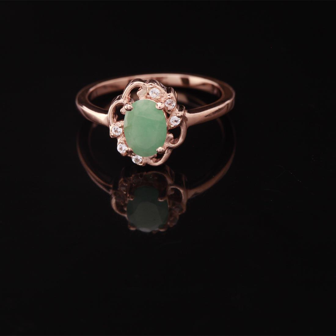 Size 8 Emerald & Zircon Rosegold Over Silver Ring: Size 8 Emerald & Zircon Rosegold Over Silver Ring • Metal: Sterling Silver • Stone: (1)7X5Mm-Emerald&White Zircon • Width: 10.6 Mm • Total Weight: 2.01 Grs • Finish: Rose