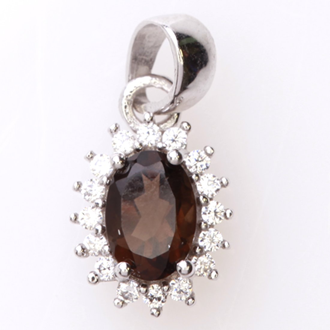 Sterling Silver Smoky Quartz & Zircon Halo Pendant: Sterling Silver Smoky Quartz & Zircon Halo Pendant • Metal: Sterling Silver • Stone: (1)7X5Mm-Smoky Qtz&White Zircon • Dimensions: 17.65X8.86 Mm • Total Weight: 1.06 Grs • Fin